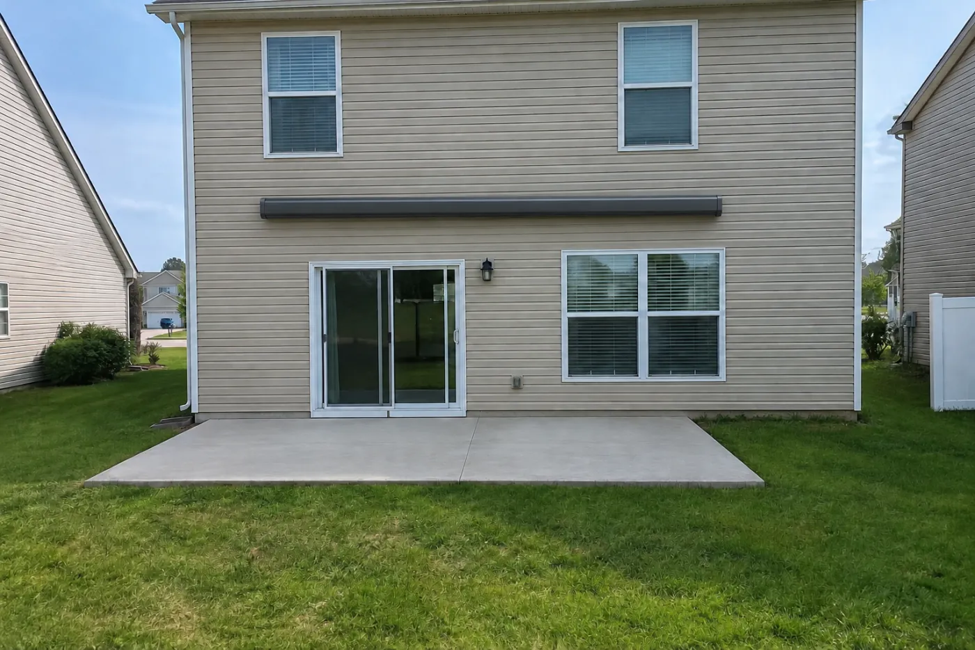 The same house with its awning rolled into the cassette